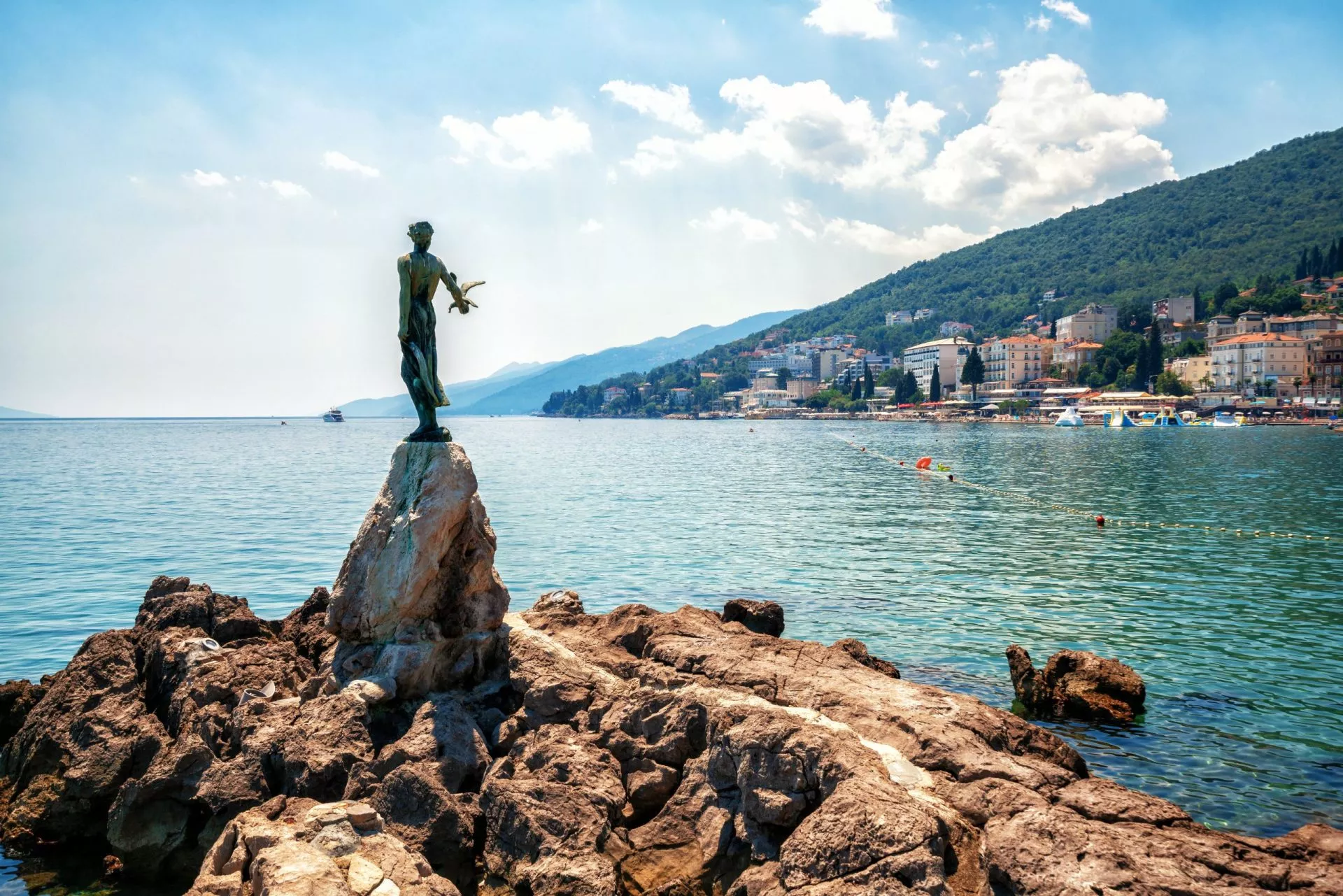 The historic statue of Maiden with the seagull is a symbol, not only of Opatija, but the entire Kvarner region. The statue on Adriatic coast is in the touristic town of Opatija in Croatia, Europe